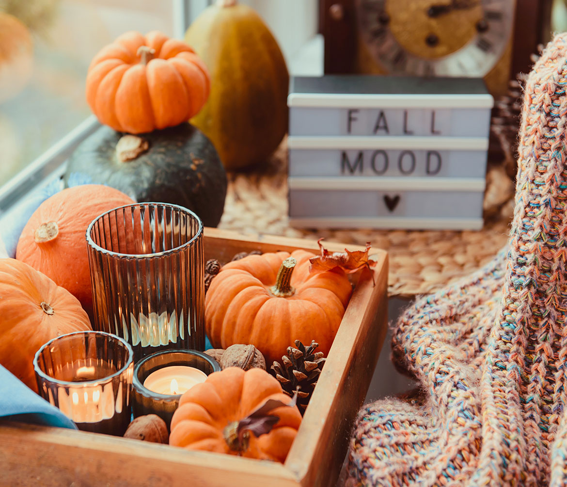 Fall Mood decor with pumpkins and candles.